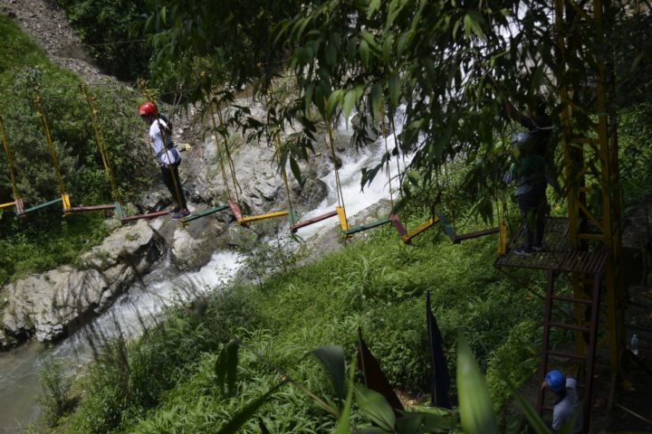 “When was the last time you did something for the first time” walk over the rive in rope challenge course in Gangtok